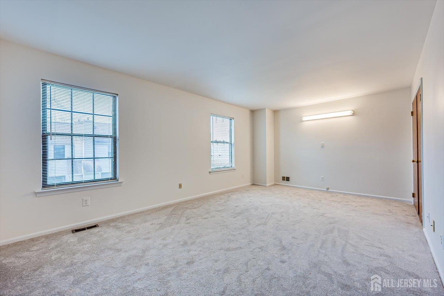 404 Maplecrest Road Edison, NJ 08820 - Photo 18 of 25 an empty room with windows