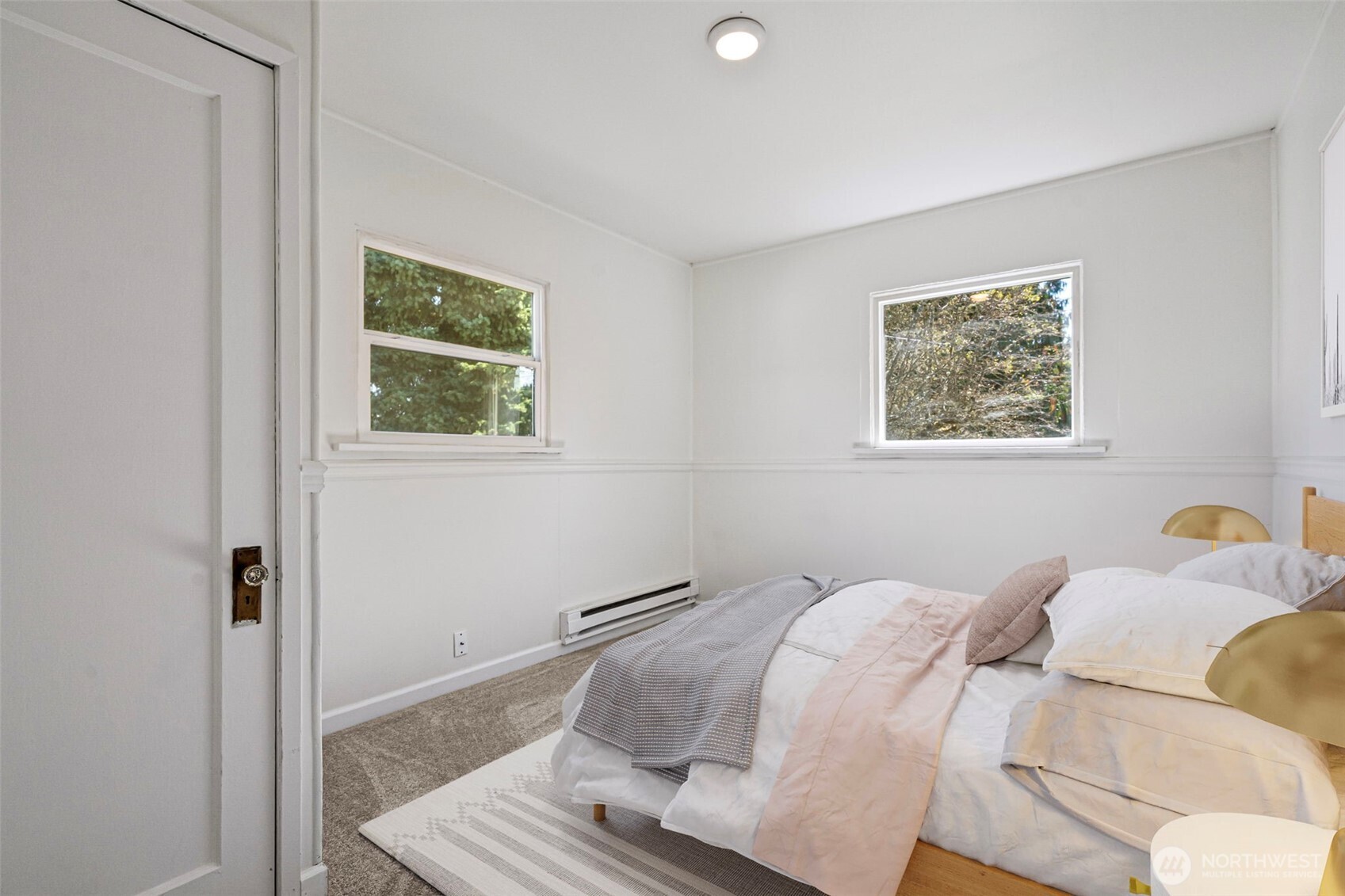 717 Ramsdell Street Fircrest, WA 98466 - Photo 13 of 29 a bedroom with a bed and a window