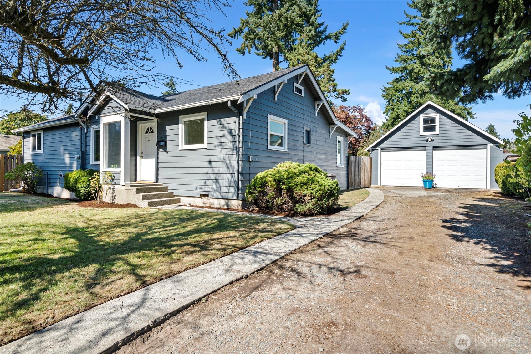 717 Ramsdell Street Fircrest, WA 98466 - Photo 2 of 29 a front view of a house with garden