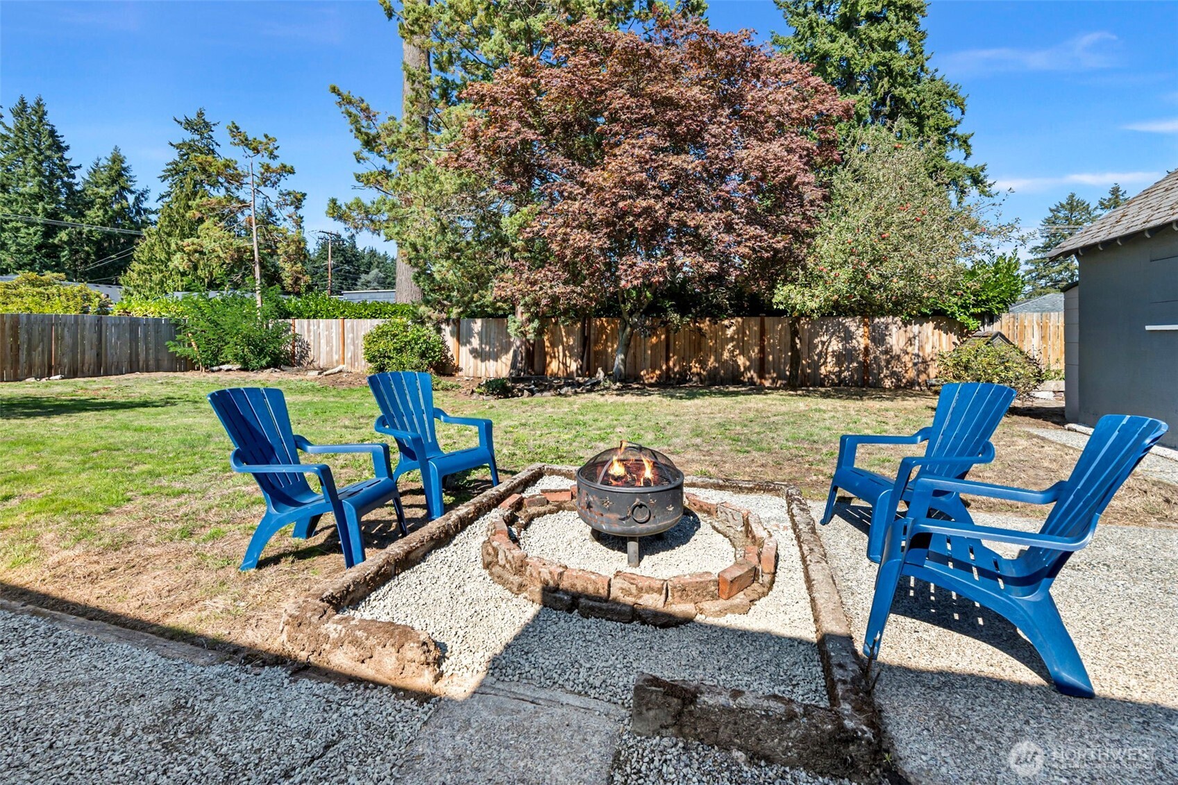 717 Ramsdell Street Fircrest, WA 98466 - Photo 22 of 29 a view of a backyard with furniture and garden