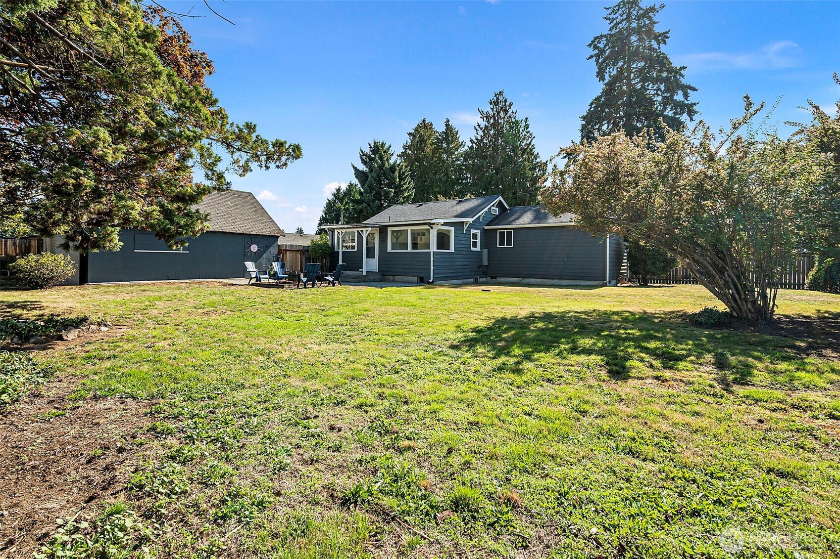 717 Ramsdell Street Fircrest, WA 98466 - Photo 25 of 29 a view of a house with a yard