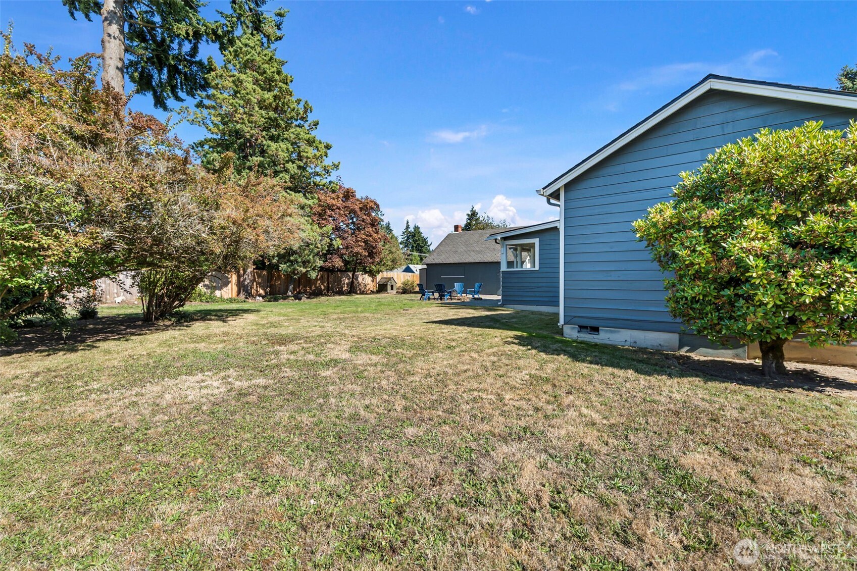 717 Ramsdell Street Fircrest, WA 98466 - Photo 26 of 29 a view of a house with a yard
