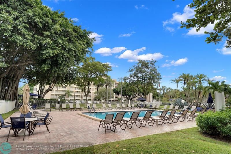 Palm Aire Pompano Beach, FL 33069 - Photo 11 of 12 a view of a chairs and table in the patio