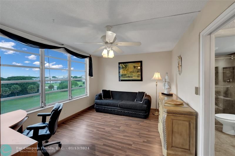 Palm Aire Pompano Beach, FL 33069 - Photo 9 of 12 a living room with furniture and a large window
