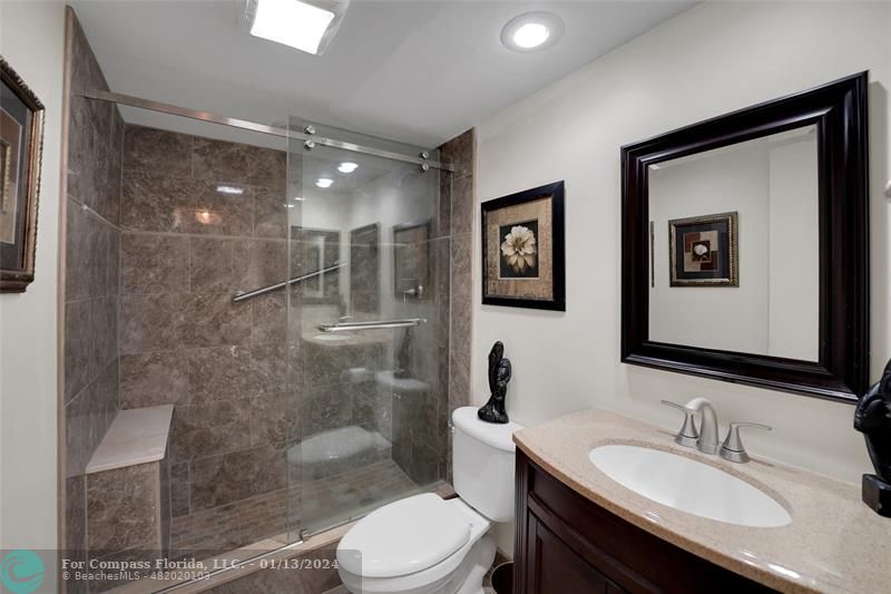 Palm Aire Pompano Beach, FL 33069 - Photo 10 of 12 a bathroom with a sink a toilet and shower