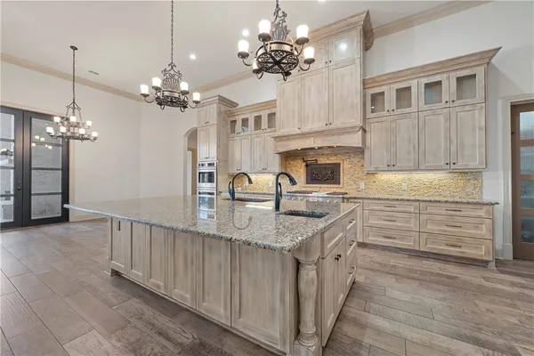 a view of a livingroom with a ceiling fan and window
