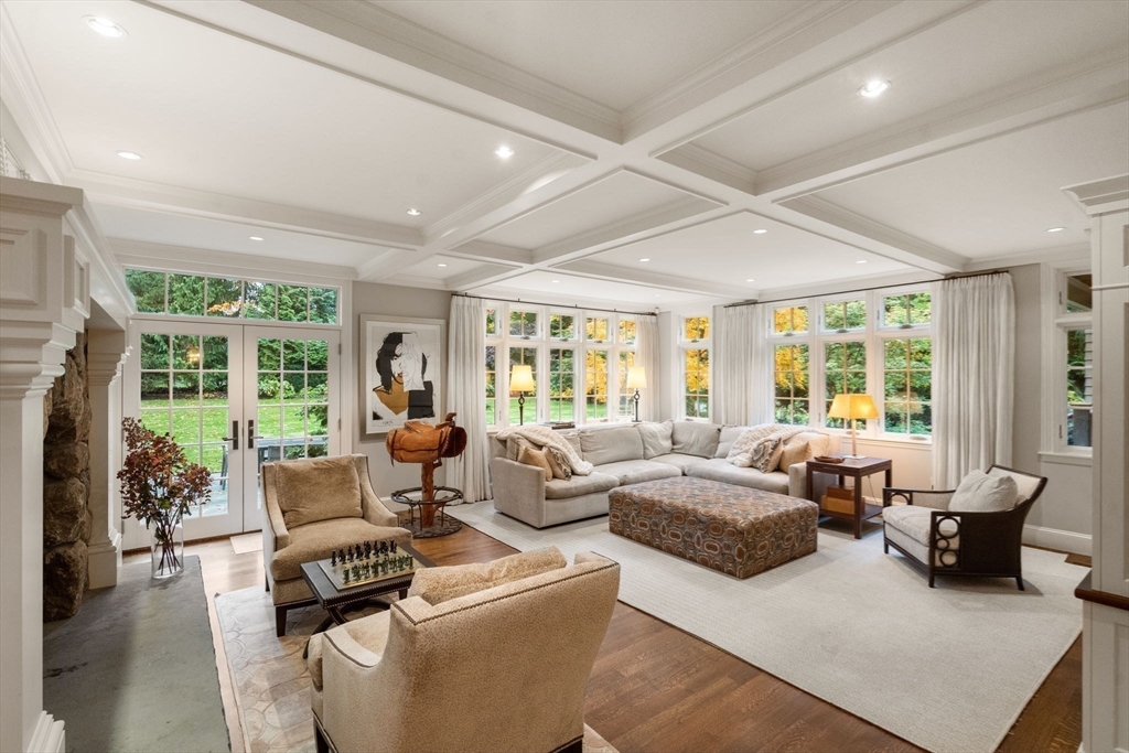 14 Greylock Road Wellesley, MA 02481 - Photo 11 of 24 a living room with furniture and large windows