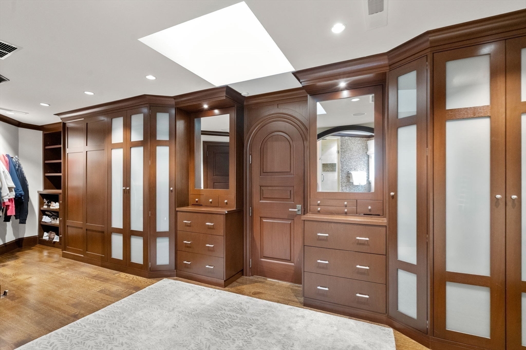 14 Greylock Road Wellesley, MA 02481 - Photo 13 of 24 a hall with stainless steel appliances granite countertop cabinets and a dresser