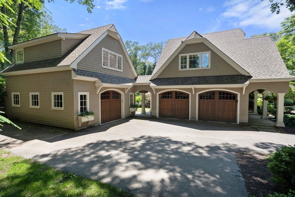 14 Greylock Road Wellesley, MA 02481 - Photo 22 of 24 a front view of a house with a yard