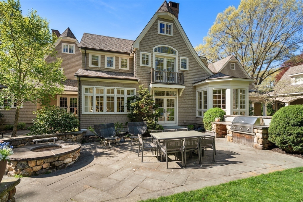 14 Greylock Road Wellesley, MA 02481 - Photo 23 of 24 a view of a house with a yard and sitting area