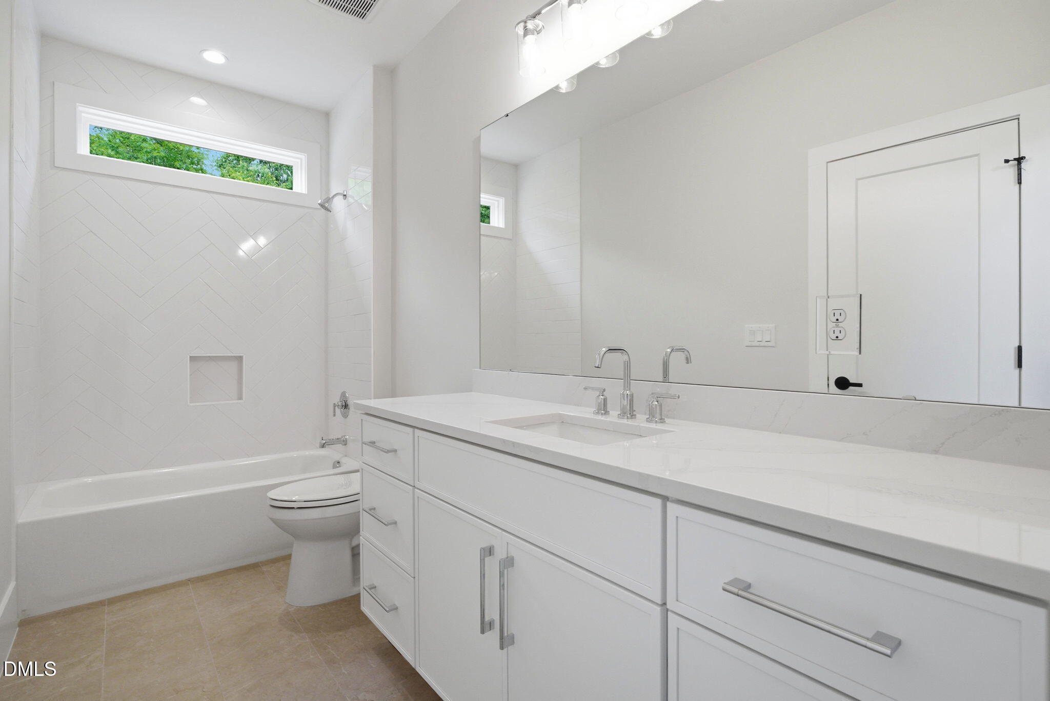 1304 Sanctuary Pond Drive Raleigh, NC 27606 - Photo 31 of 52 a bathroom with a granite countertop sink a toilet and bathtub