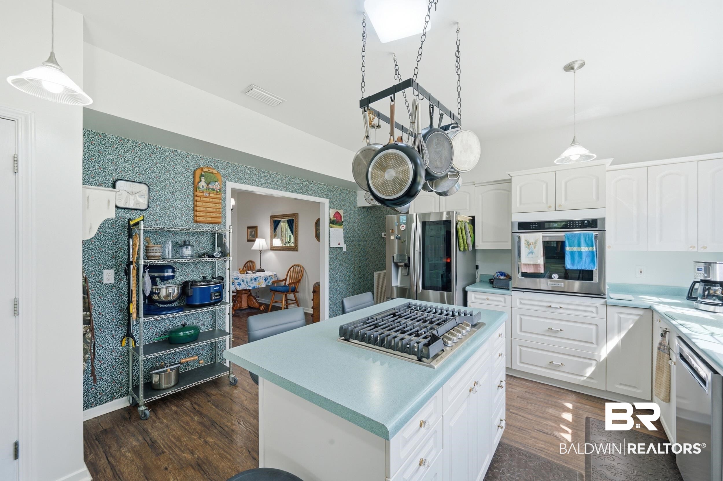 15855 Calvin Richerson Road Bay Minette, AL 36507 - Photo 27 of 83 Kitchen featuring white cabinetry and light blue countertops