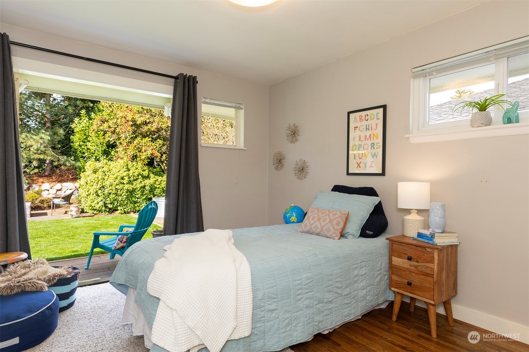 1505 35th Avenue South Seattle, WA 98144 - Photo 19 of 39 a bedroom with a bed and a window