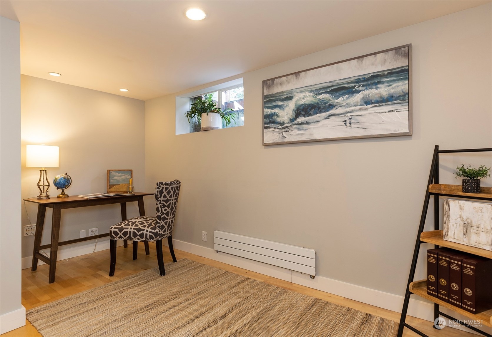 1505 35th Avenue South Seattle, WA 98144 - Photo 23 of 39 a view of a workspace with furniture and wooden floor