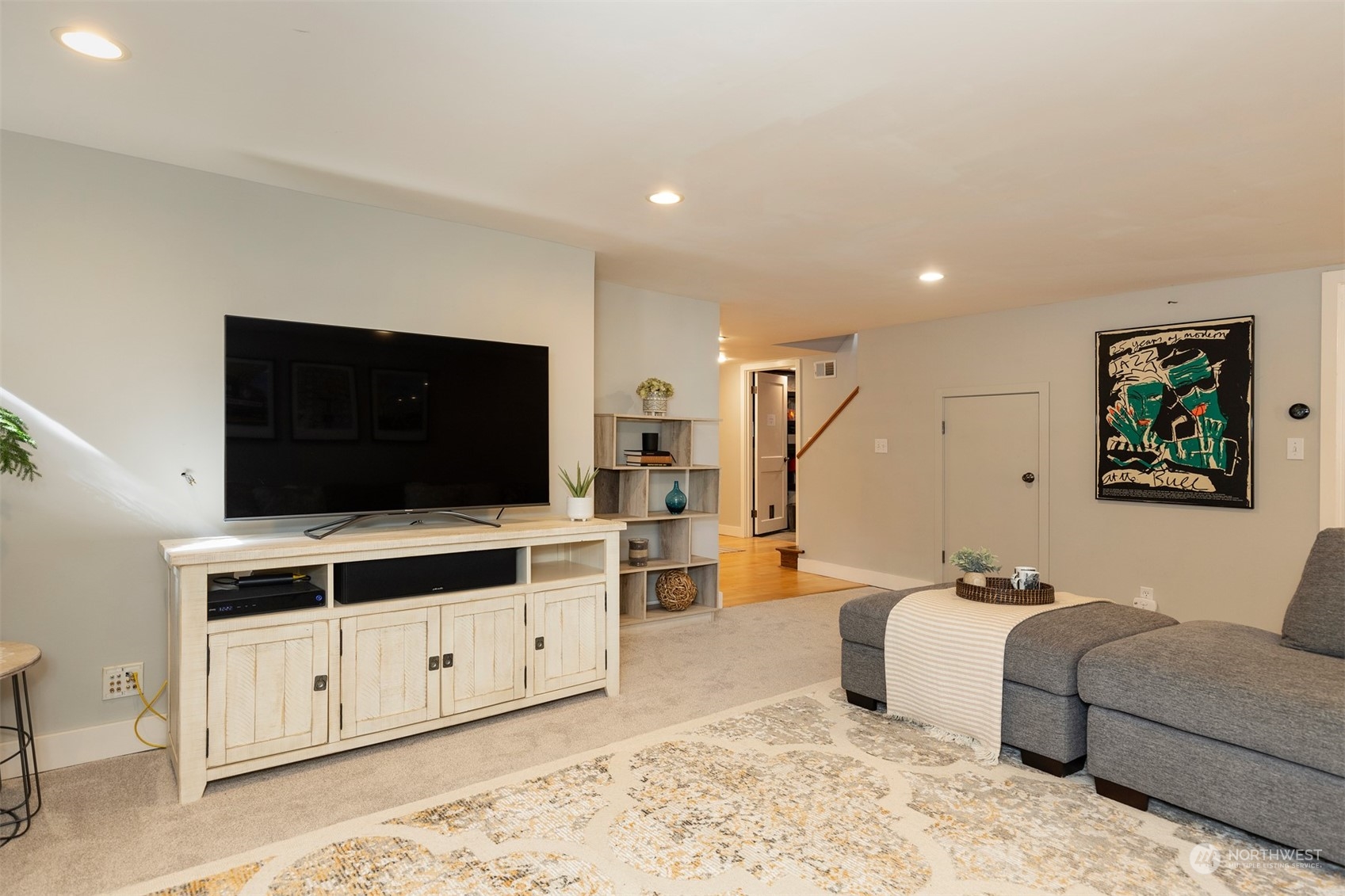 1505 35th Avenue South Seattle, WA 98144 - Photo 24 of 39 a living room with furniture and a flat screen tv