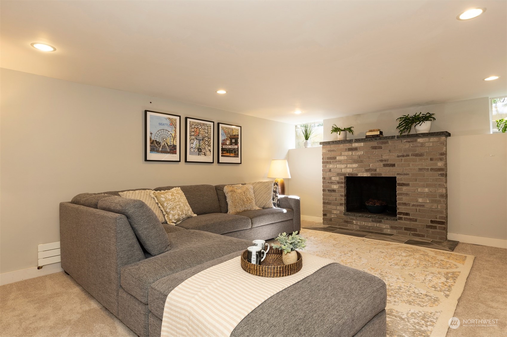 1505 35th Avenue South Seattle, WA 98144 - Photo 26 of 39 a living room with furniture and a fireplace