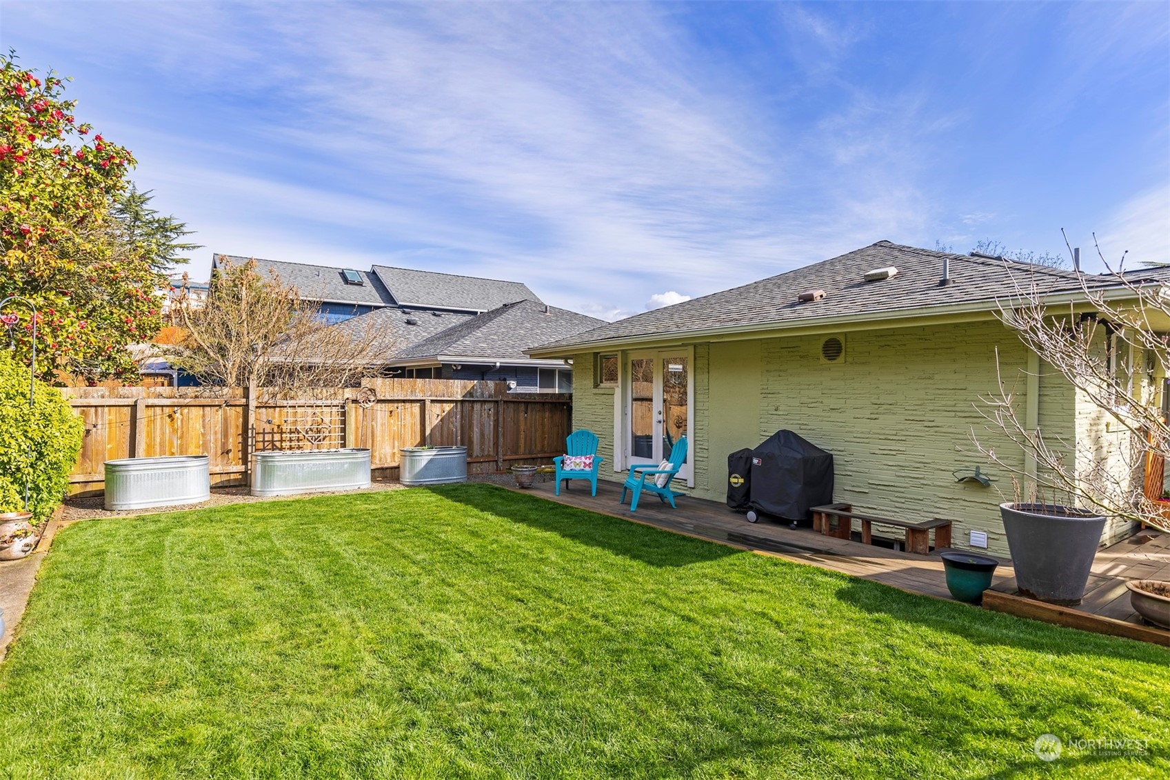 1505 35th Avenue South Seattle, WA 98144 - Photo 36 of 39 a view of a house with a yard and sitting area