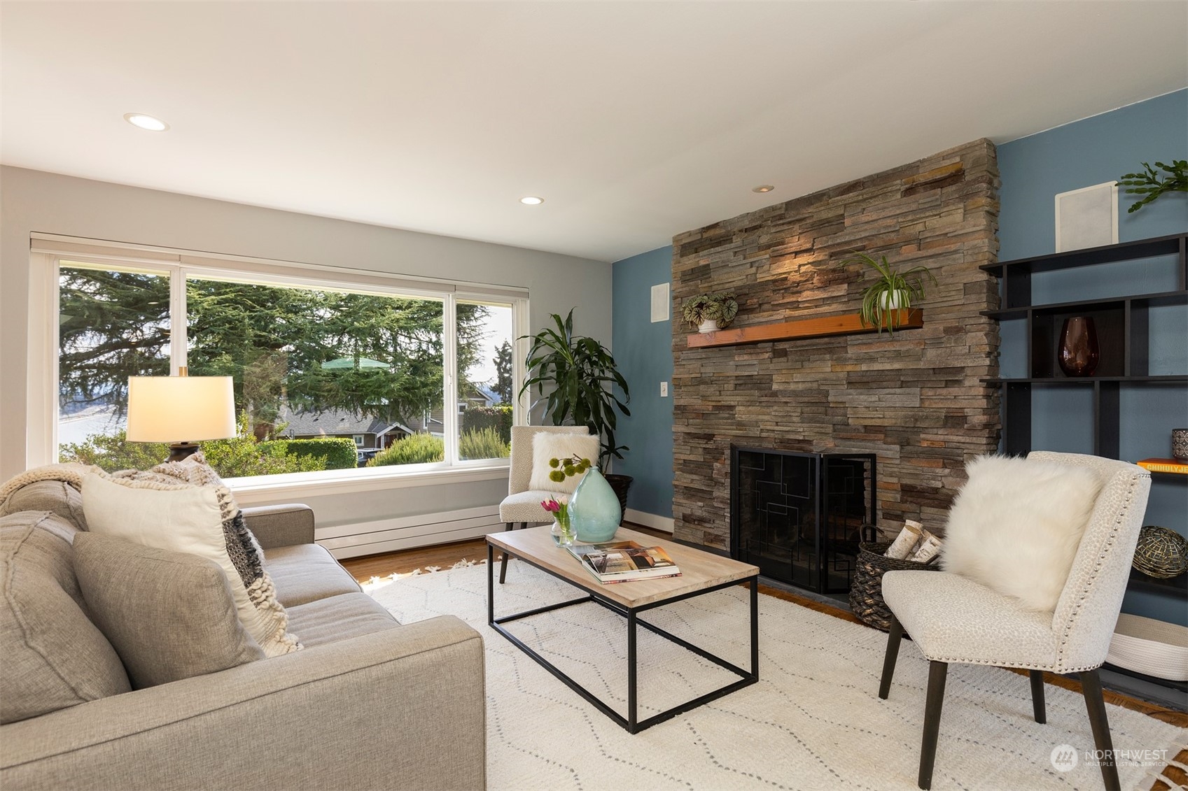 1505 35th Avenue South Seattle, WA 98144 - Photo 5 of 39 a living room with furniture and a fireplace