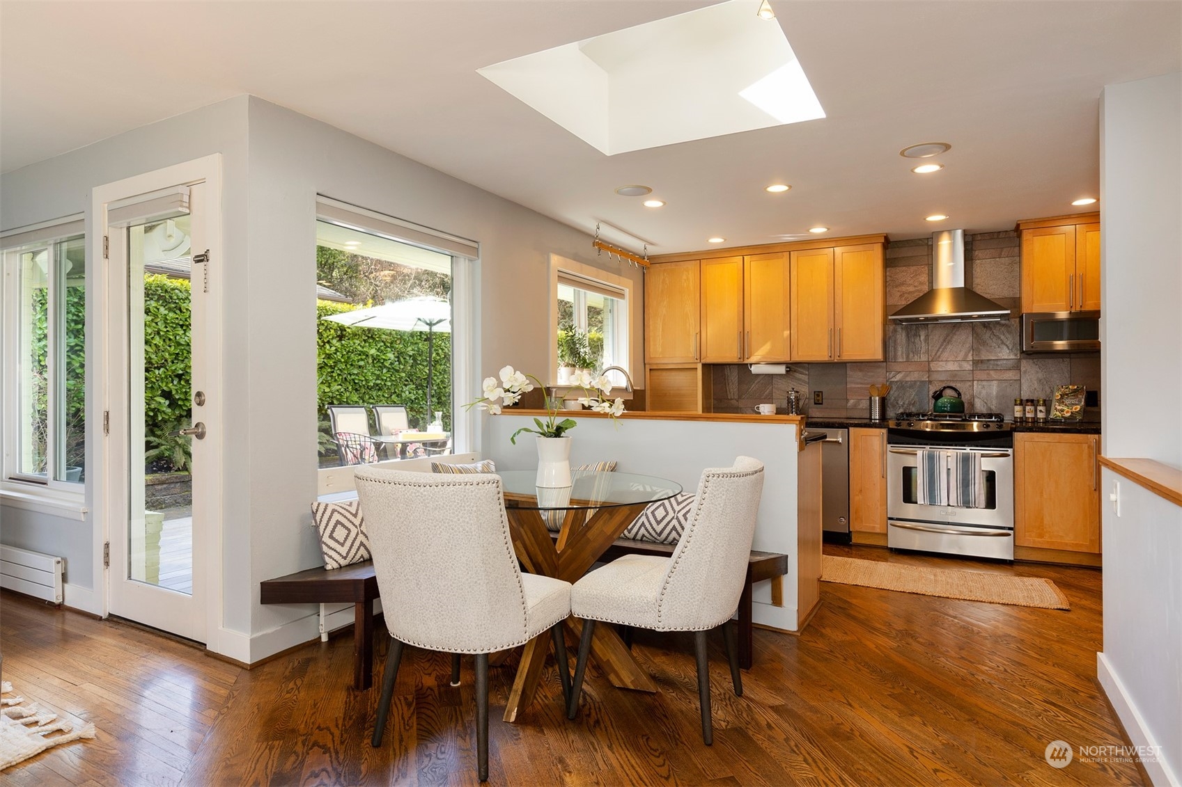 1505 35th Avenue South Seattle, WA 98144 - Photo 10 of 39 a view of a dining room with furniture window and wooden floor