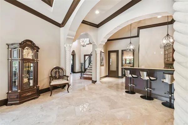 a bathroom with a granite countertop sink toilet a mirror and shower