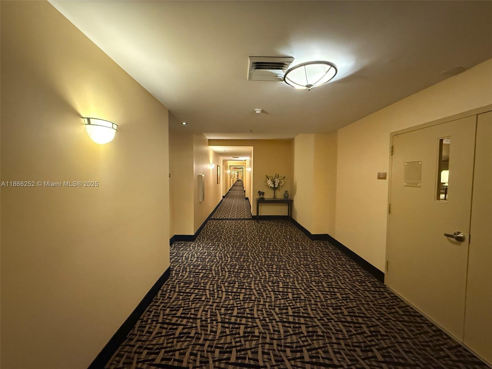 8395 Southwest 73rd Avenue, Unit 509 Miami, FL 33143 - Photo 27 of 41 a view of a hallway