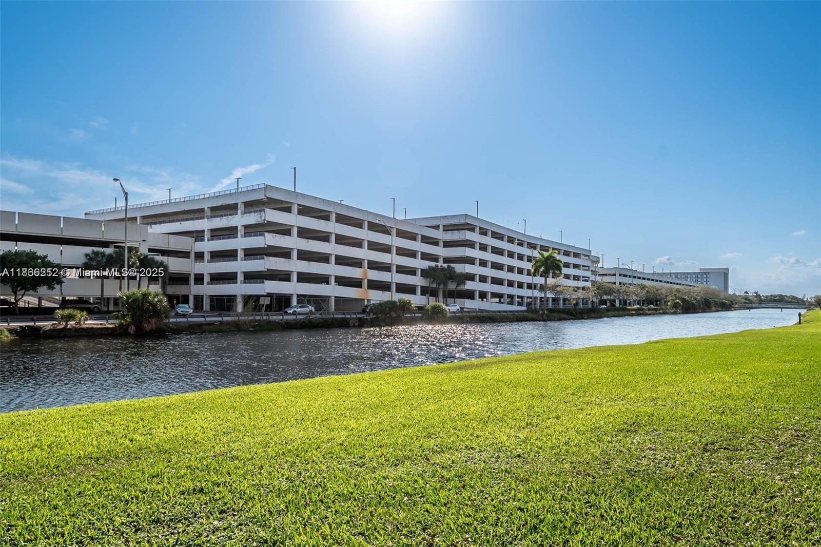 8395 Southwest 73rd Avenue, Unit 509 Miami, FL 33143 - Photo 35 of 41 a view of a swimming pool with an outdoor seating