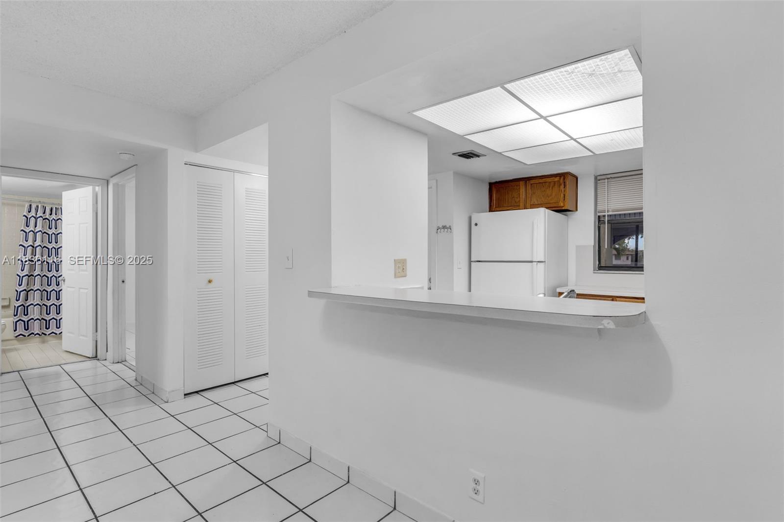 12239 Southwest 14th Lane, Unit 3212 Miami, FL 33184 - Photo 13 of 36 a view of a storage & utility room