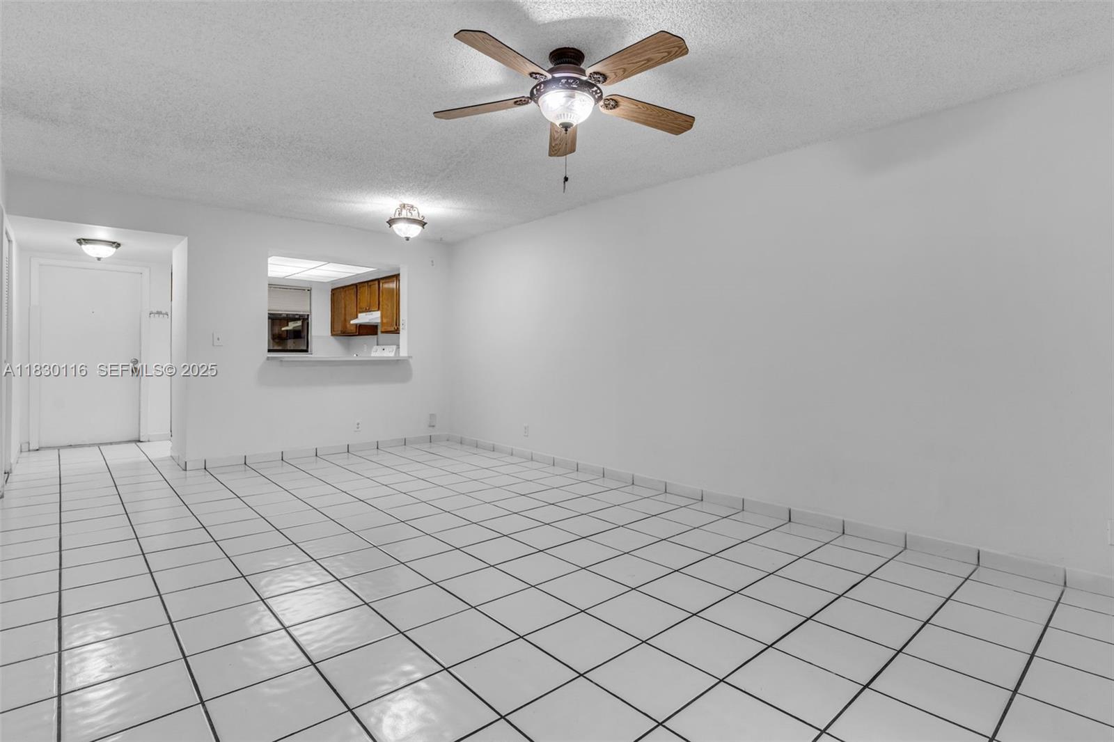 12239 Southwest 14th Lane, Unit 3212 Miami, FL 33184 - Photo 14 of 36 a view of a livingroom with natural light