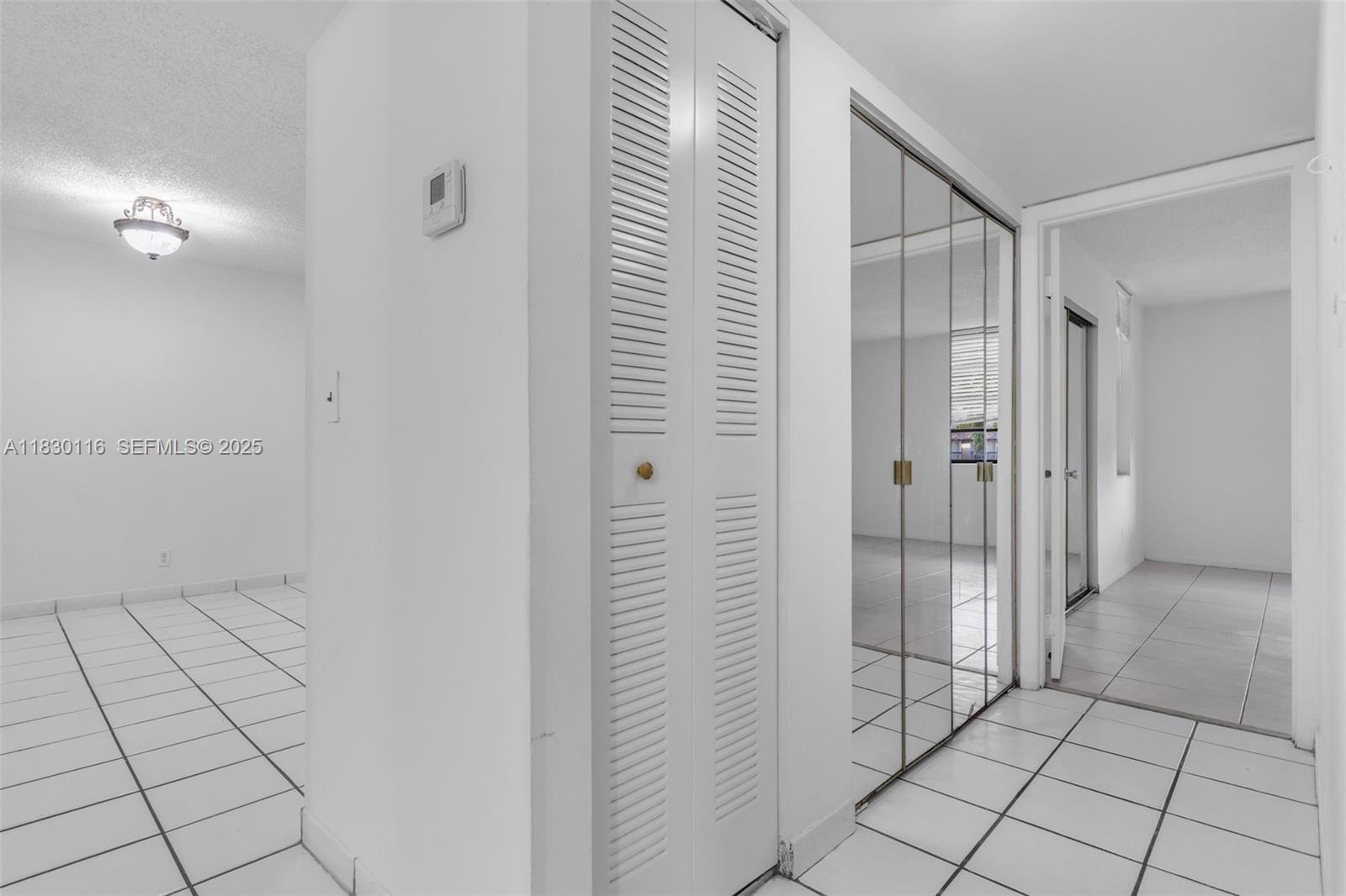 12239 Southwest 14th Lane, Unit 3212 Miami, FL 33184 - Photo 24 of 36 a view of an empty room