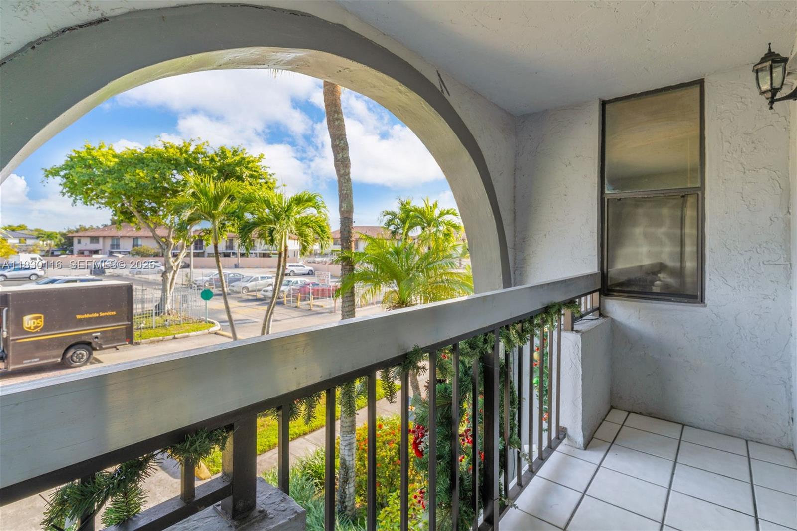 12239 Southwest 14th Lane, Unit 3212 Miami, FL 33184 - Photo 3 of 36 a view of a balcony