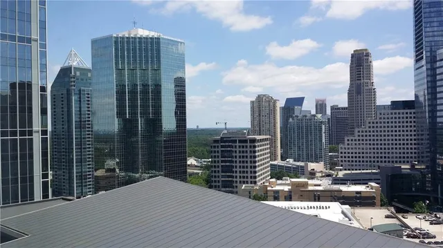 a view of a city with tall buildings
