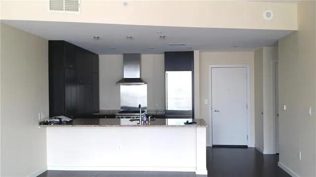 a view of a bathroom with a tub sink and mirror