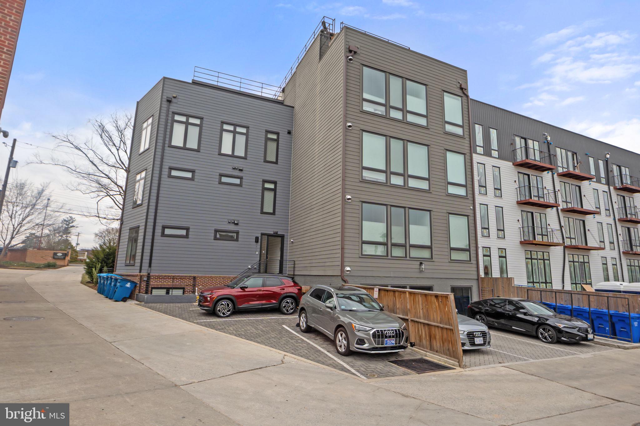 4315 Harrison Street Northwest, Unit 5 Washington, DC 20015 - Photo 22 of 33 a car parked in front of a building