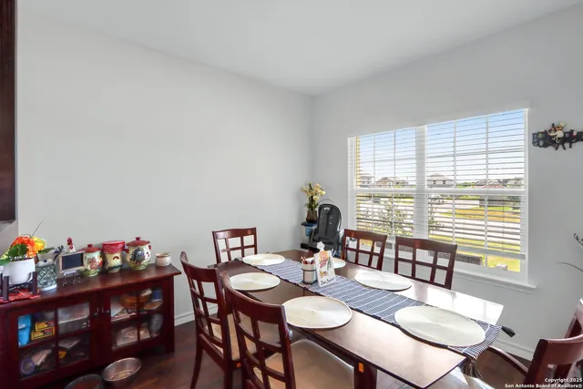 a view of a dining room with furniture