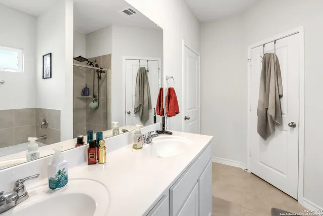 a white bath tub sitting in a bathroom