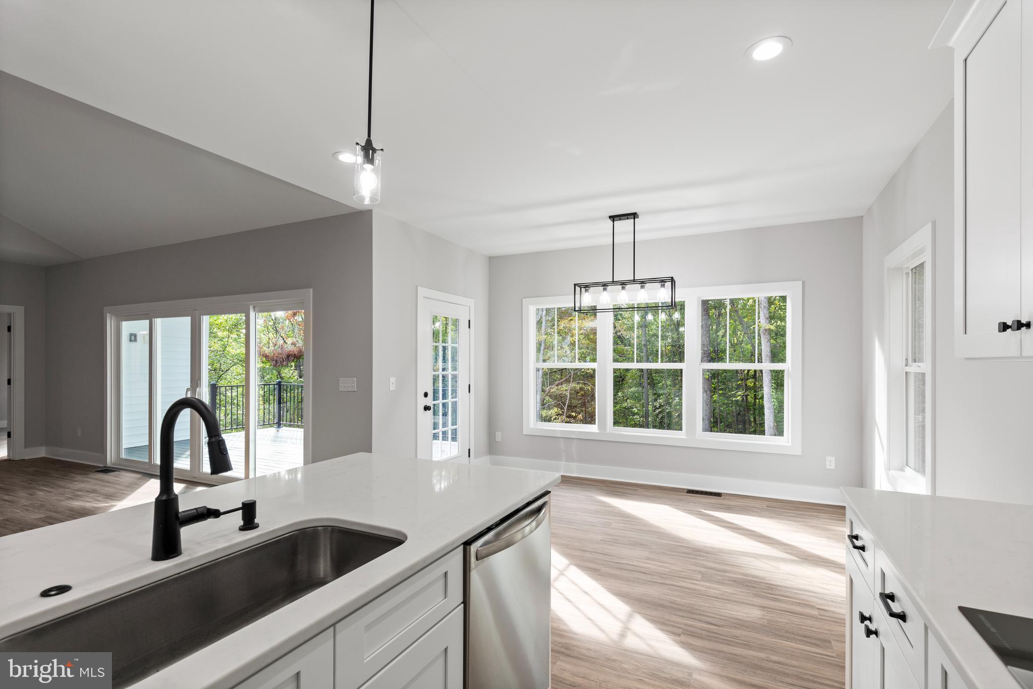 Tbd Lookout Circle Orange, VA 22960 - Photo 15 of 48 a view of a kitchen with a sink and large windows