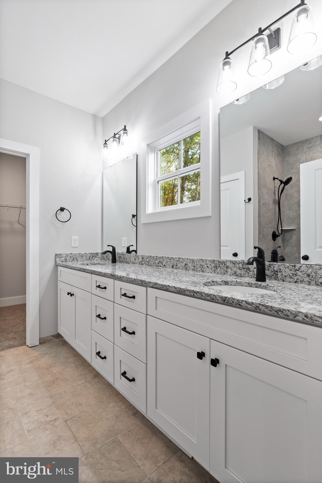 Tbd Lookout Circle Orange, VA 22960 - Photo 24 of 48 a bathroom with a granite countertop sink mirror and