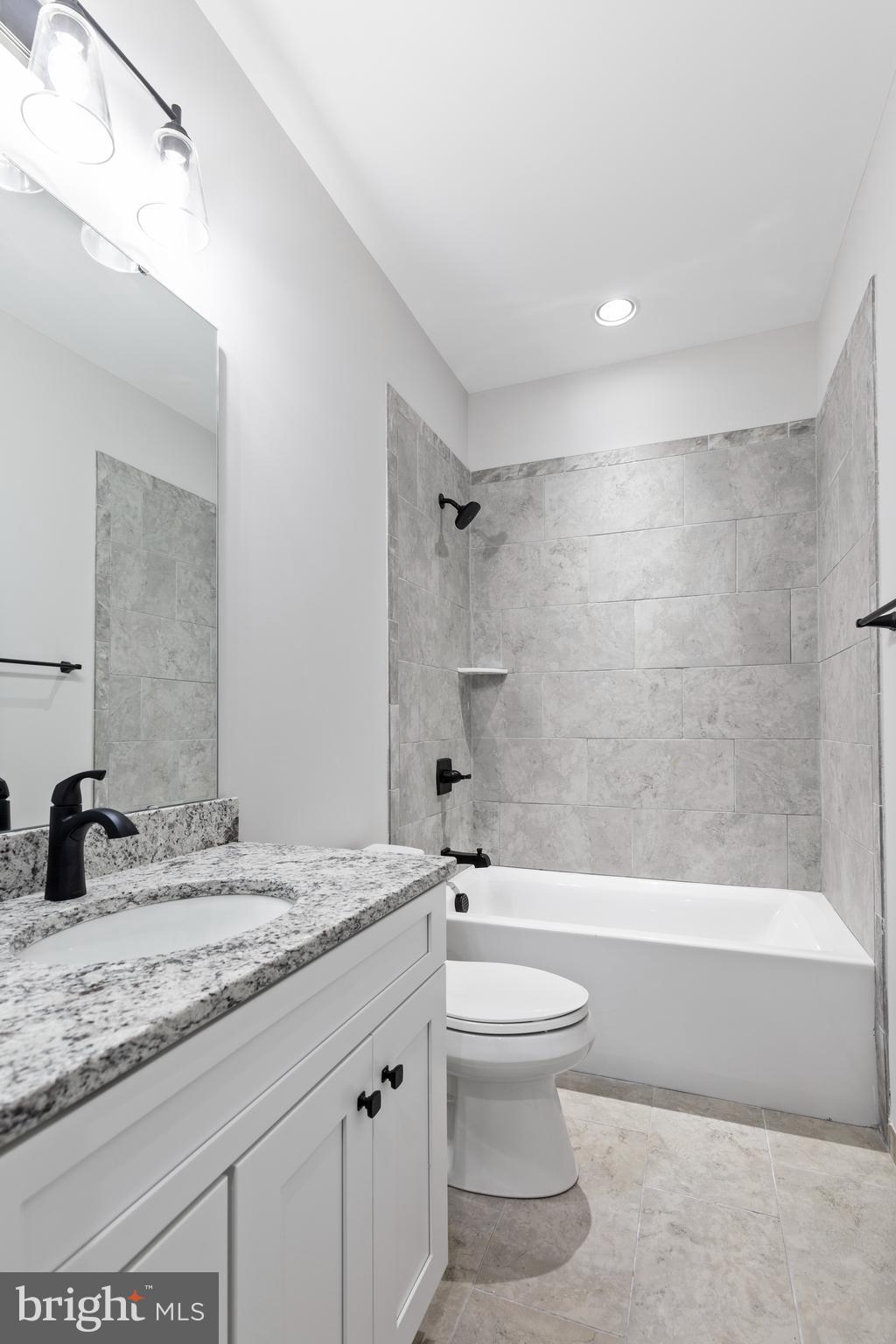 Tbd Lookout Circle Orange, VA 22960 - Photo 41 of 48 a bathroom with a granite countertop sink a toilet and shower