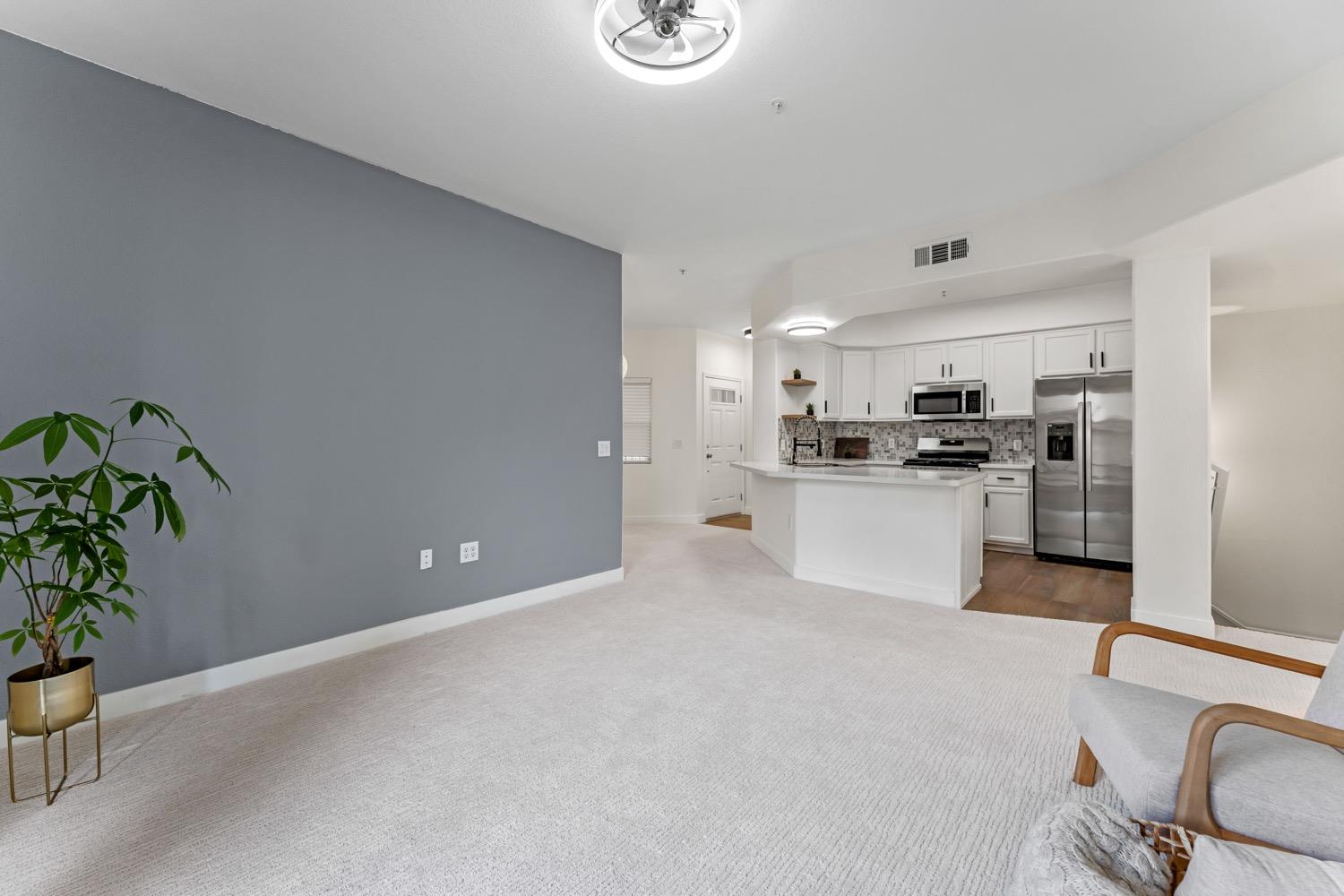 700 Moon Circle, Unit 723 Folsom, CA 95630 - Photo 1 of 1 a kitchen with stainless steel appliances a refrigerator sink and stove