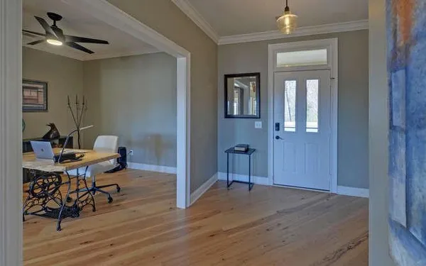 a workspace with wooden floor