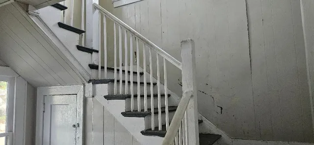 a view of entryway with wooden floor