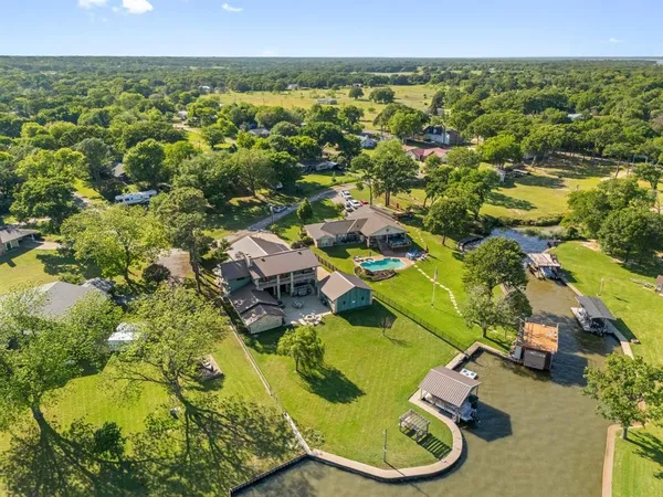 an aerial view of a house with a garden