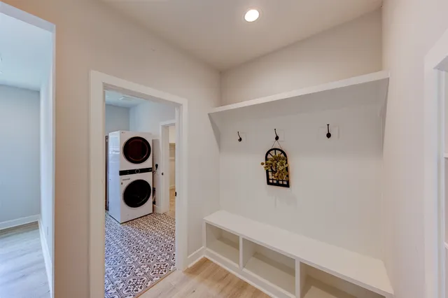 a view of a kitchen cabinets and wooden floor