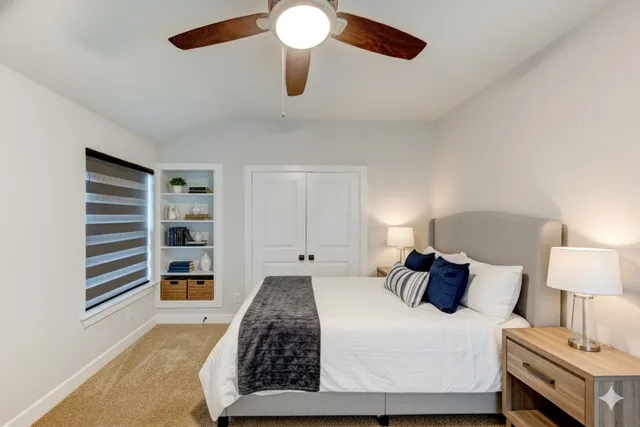 a bedroom with a bed and closet