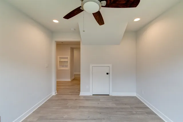 a living room with furniture and garden