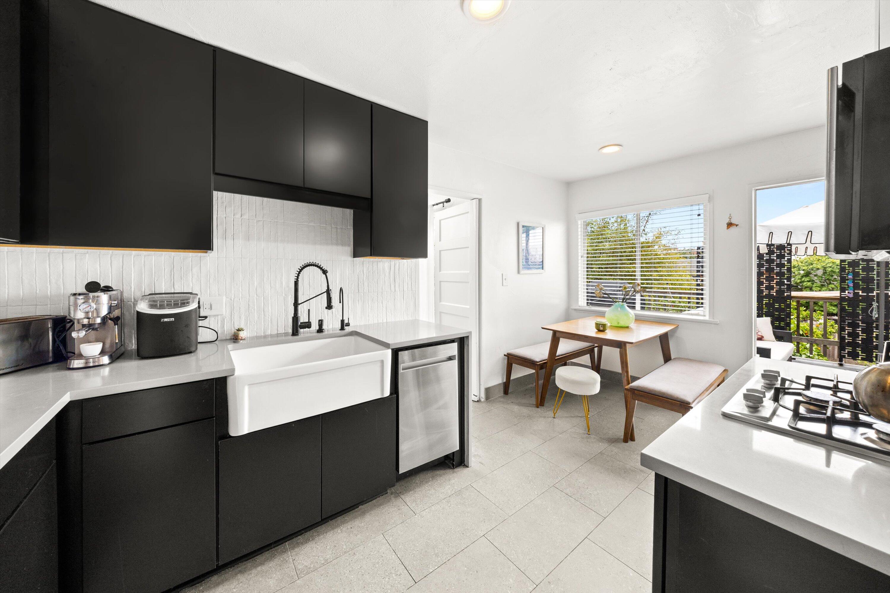424 East Arrellaga Street Santa Barbara, CA 93101 - Photo 14 of 32 a living room with furniture and a flat screen tv