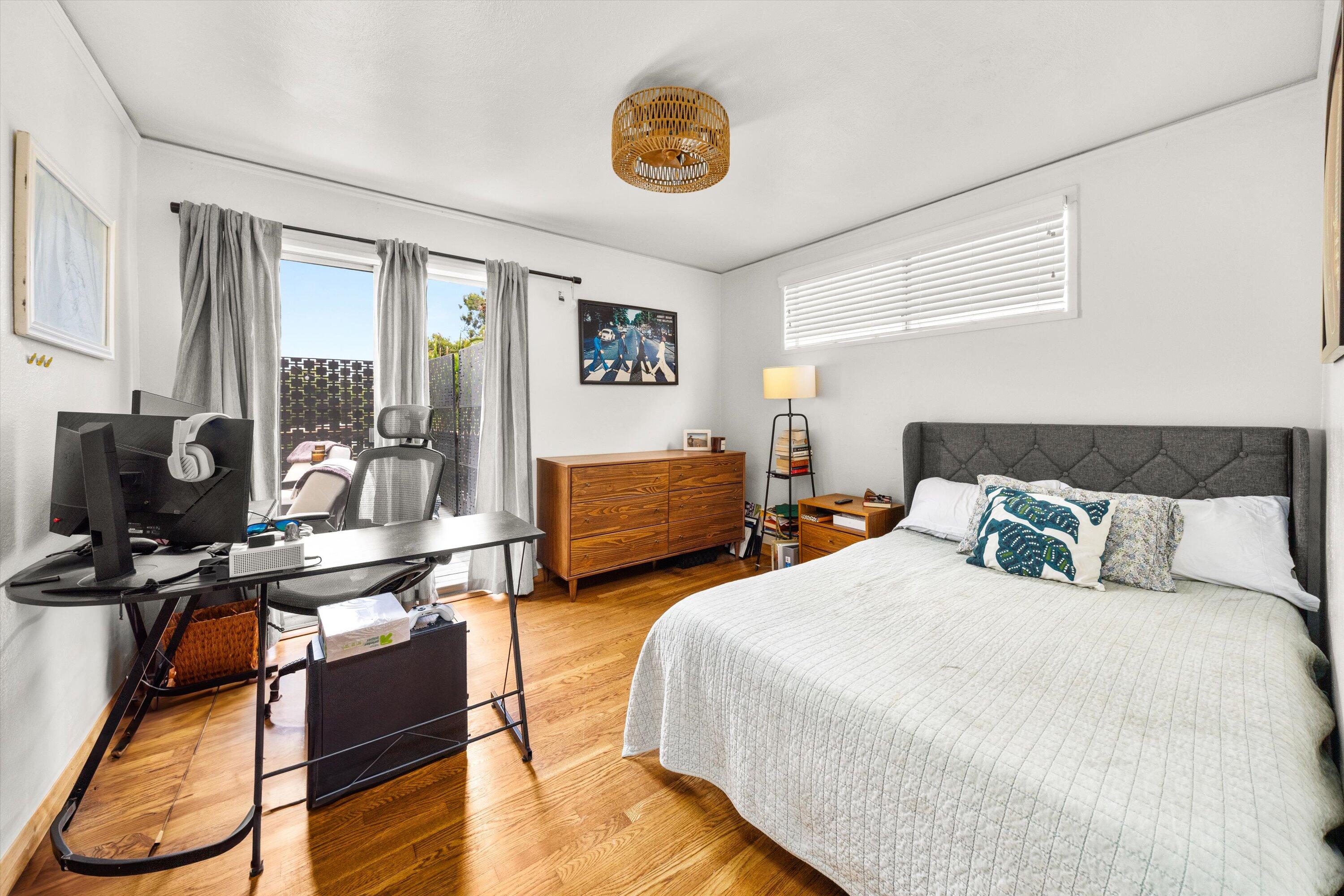 424 East Arrellaga Street Santa Barbara, CA 93101 - Photo 19 of 32 a bedroom with double bed and a window