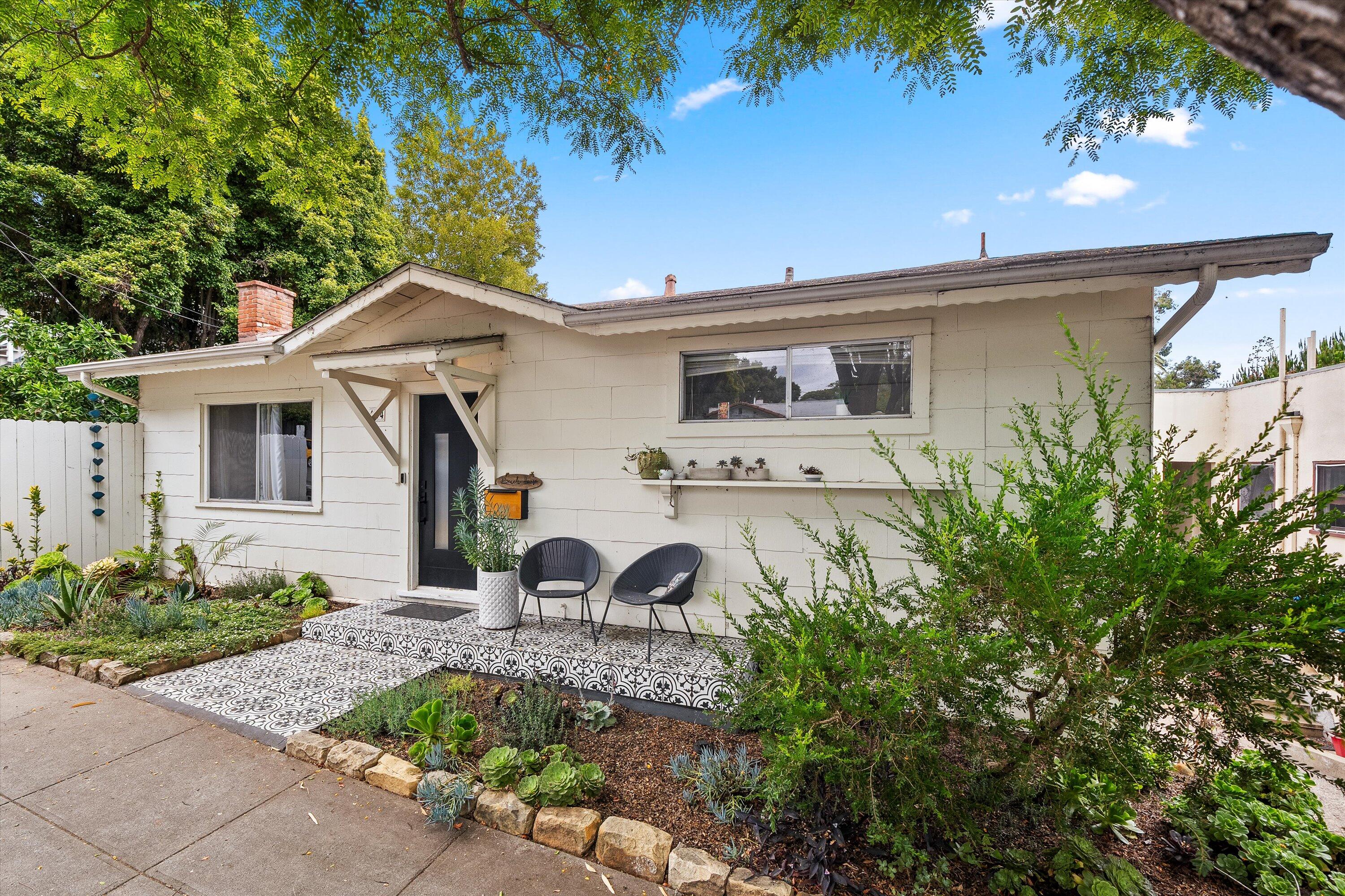 424 East Arrellaga Street Santa Barbara, CA 93101 - Photo 2 of 32 a front view of a house with garden