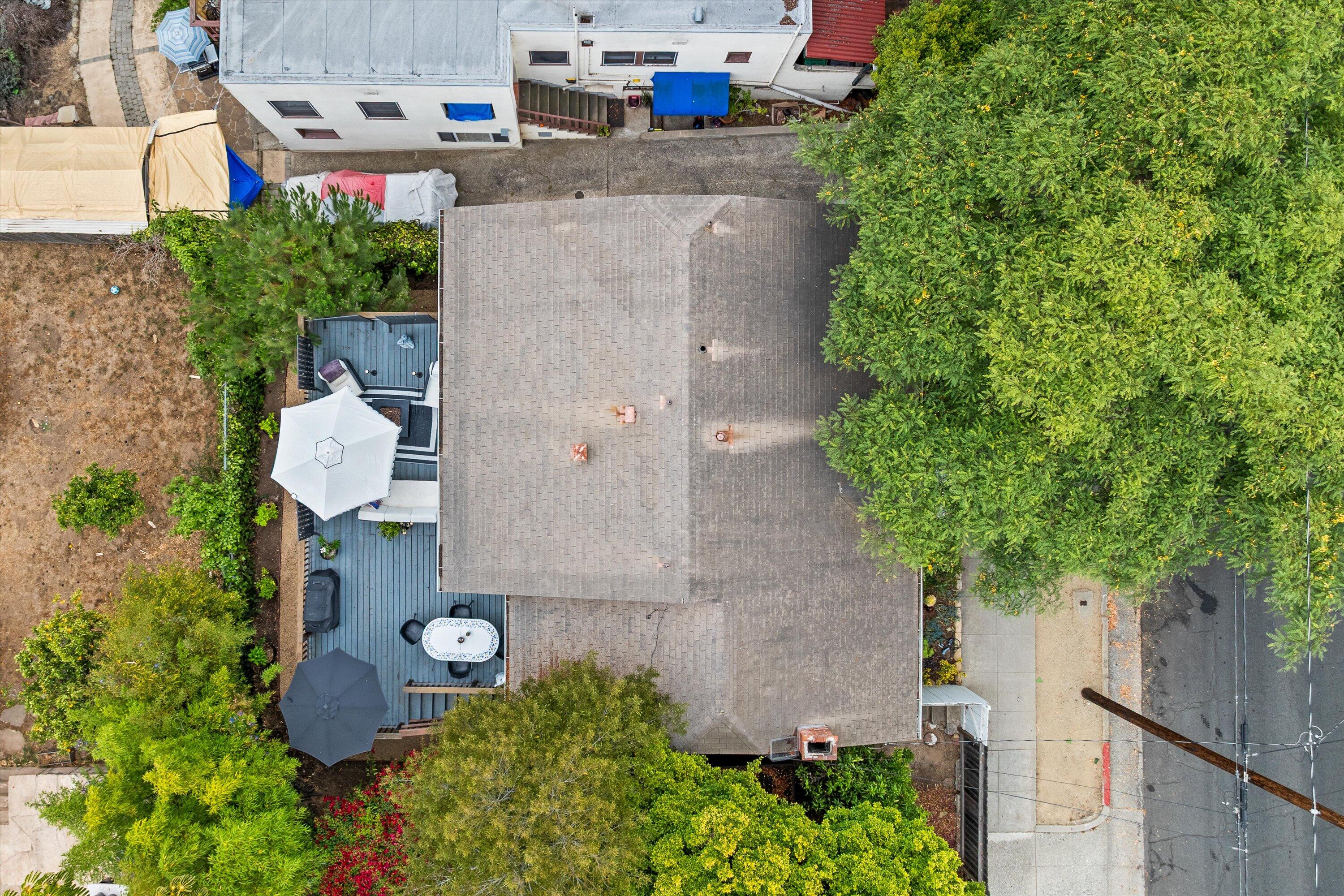 424 East Arrellaga Street Santa Barbara, CA 93101 - Photo 28 of 32 an aerial view of a house with outdoor space and trees all around