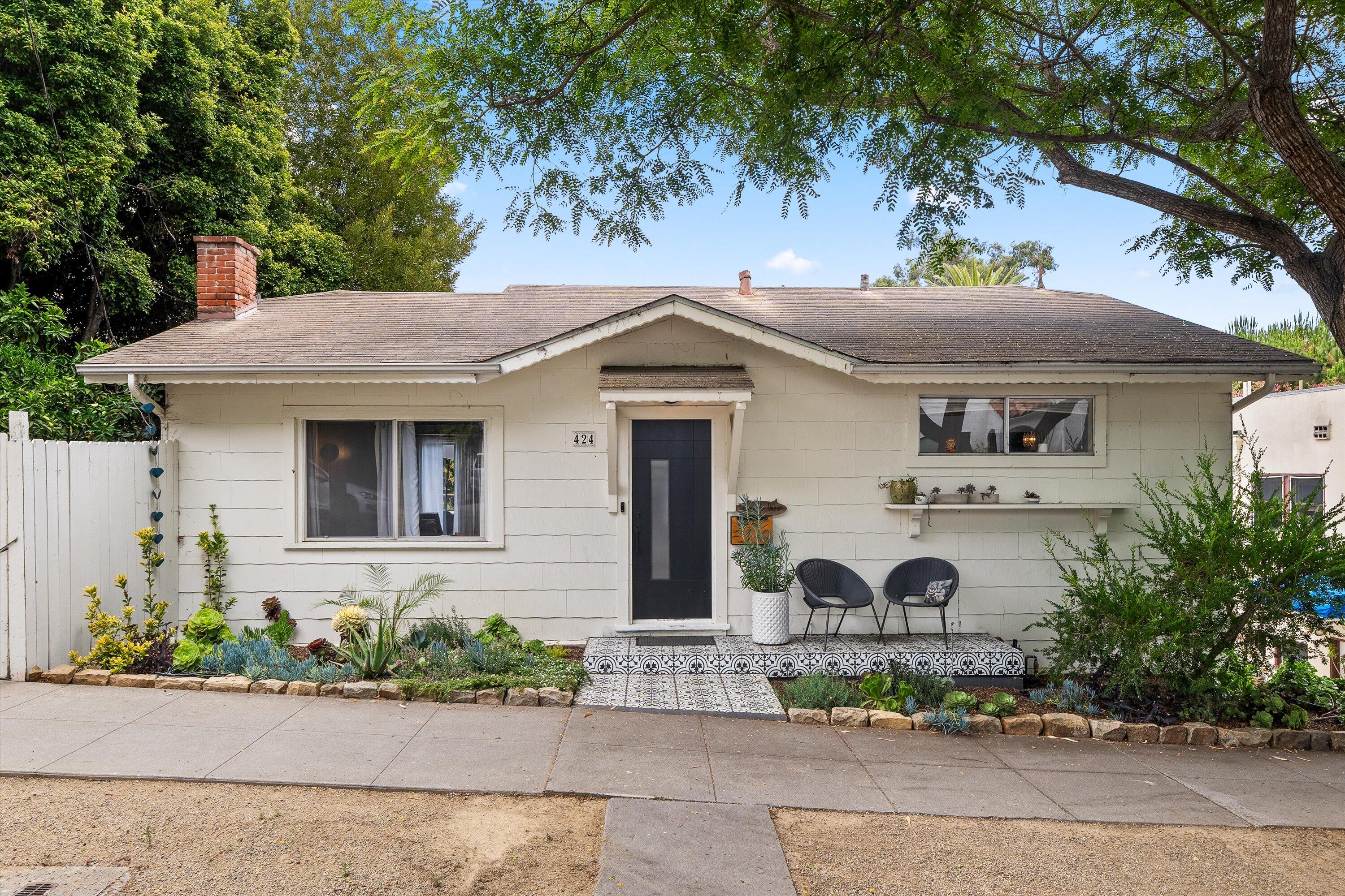 424 East Arrellaga Street Santa Barbara, CA 93101 - Photo 3 of 32 front view of a house with a garden